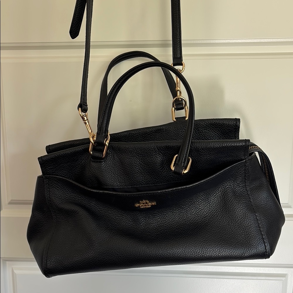 Coach Black Shoulder Bag with Gold Accents and Versatile Design